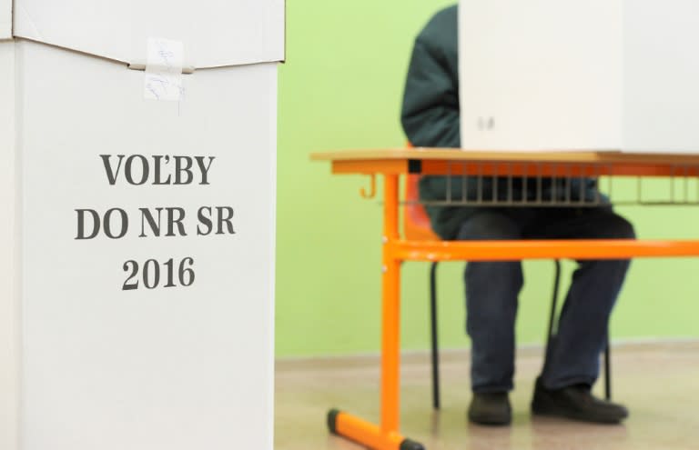 A man prepares his vote during the general elections in Trnava, Slovakia, on March 5, 2016