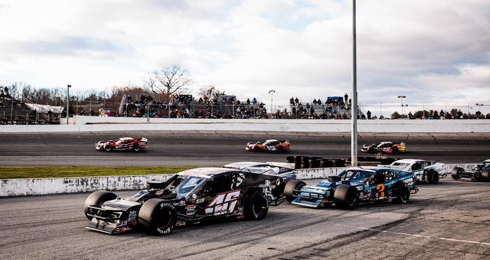 Justin Borwn, driver of the No. 46 Riverhead Building Supply Troyer, and Jake Johnson, driver of the No. 3 Propane Plus Racing car, enter the pits during the IceBreaker 150 on the Whelen Modified Tour at Thompson Speedway Motorsports Park on April 7, 2024 in Thompson, Connecticut. (Nick Grace/NASCAR)