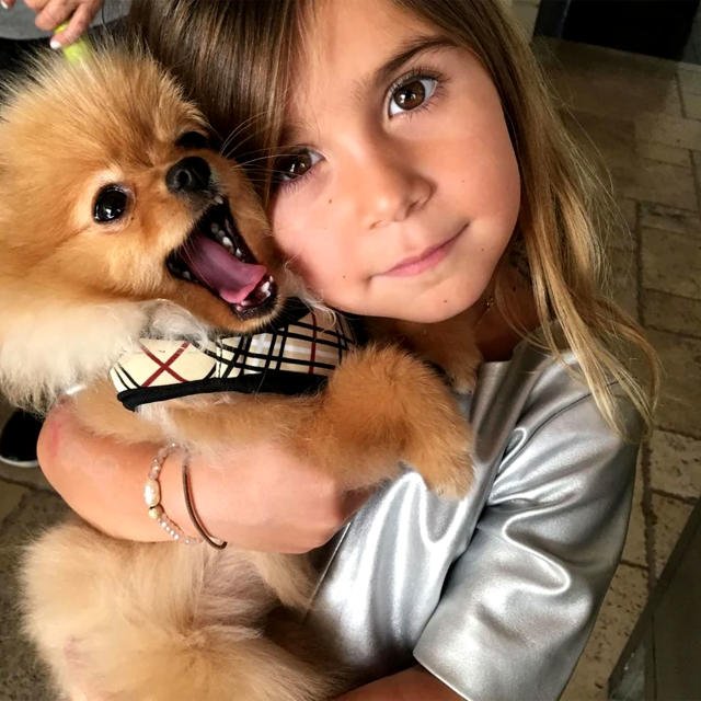 Khloé Kardashian's Daughter True Snuggles with Pet Cat in New Photos