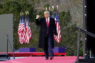 President Donald Trump leaves after speaking at a campaign rally at Keith House, Washington's Headquarters, Saturday, Oct. 31, 2020, in Newtown, Pa. (AP Photo/Alex Brandon)