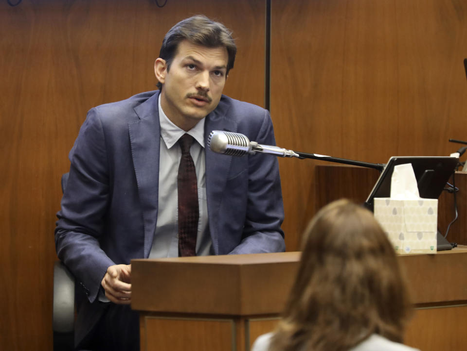 FILE - Ashton Kutcher testifies in the murder trial of Michael Gargiulo at Los Angeles Superior Court, in a Wednesday, May 29, 2019file photo. Iowa Auditor Rob Sand says the Test Iowa program brought to the state under a $28 million no-bid contract by Gov. Kim Reynolds on recommendation of actor and Iowa native Ashton Kutcher is violating state law in the way it handles test results data. (Frederick M. Brown/Pool via AP, File)