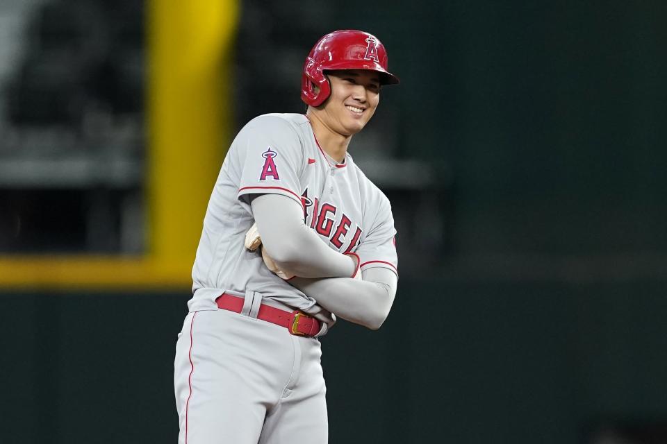 Los Angeles Angels' Shohei Ohtani stands on second after hitting a double in the ninth inning of a baseball game against the Texas Rangers in Arlington, Texas, Thursday, Sept. 22, 2022. (AP Photo/Tony Gutierrez)