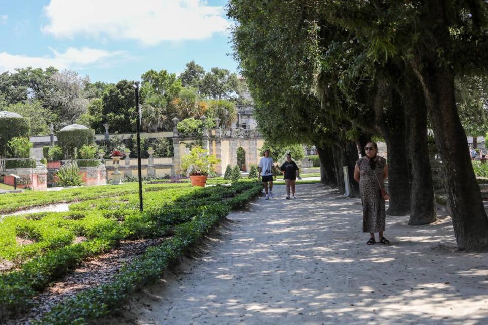 Visitors walk through the the European-inspired manicured gardens at Vizcaya Museum and Gardens on May 19.