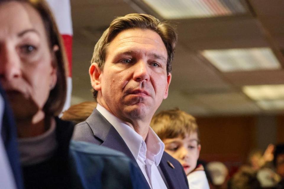 Florida Gov. Ron DeSantis attends a rally on Saturday, Jan 13, 2023, at the Never Back Down super PAC headquarters in West Des Moines, IA.