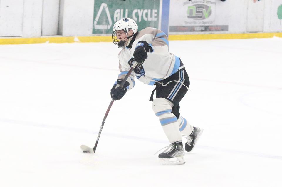 South Burlington's Lucas Van Mullen fires a shot on goal during the Wolves 5-1 win over the Cougars in the 2024 D1 semifinals at Cairns Arena.