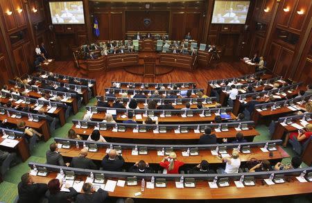 Kosovar Members of Parliament sit in the Assembly during a summer session in Pristina, August 3, 2015. REUTERS/Hazir Reka