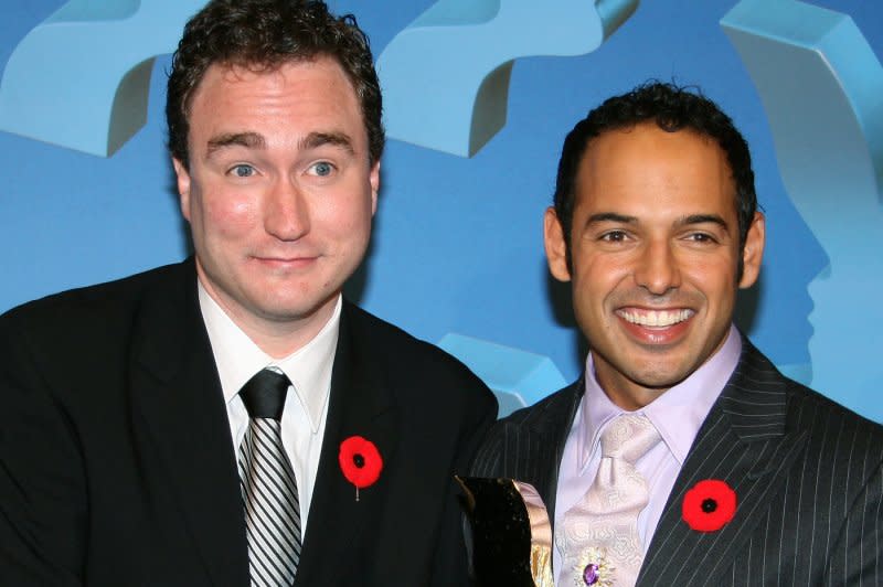 Mark Critch (L) and Shaun Majumder, winners of Best Performance in a Comedy Program, pose with their award at the 2006 Gemini Awards in River Rock Casino near Vancouver, B.C., Canada. File Photo by Peter Tanner/UPI