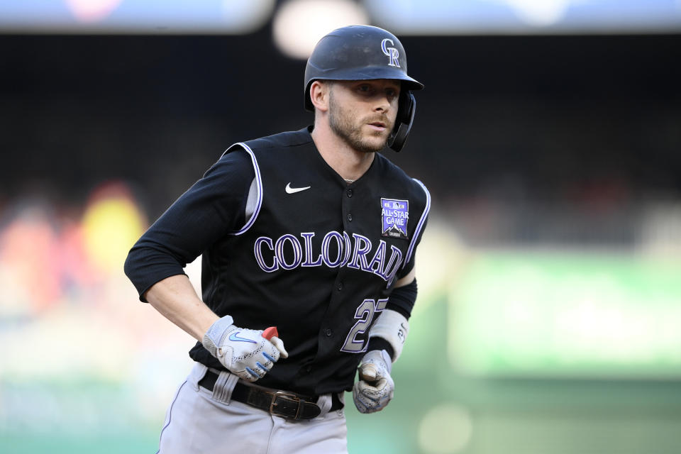 Colorado Rockies' Trevor Story rounds the bases on his three-run home run during the fourth inning of a baseball game against the Washington Nationals, Saturday, Sept. 18, 2021, in Washington. (AP Photo/Nick Wass)