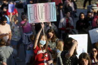 FILE - Ariel Peters holds an equality sign during a rally to support transgender youths outside of the Capitol in Salt Lake City, Thursday, March 24, 2022. (Kristin Murphy/The Deseret News via AP, File)