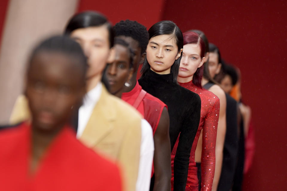 Models wear creations as part of the Ferragamo women's Spring Summer 2023 collection presented in Milan, Italy, Saturday, Sept. 24, 2022. (AP Photo/Alberto Pezzali)