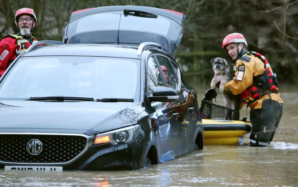 A man and his dog were rescued by Essex County Fire & Rescue Service using a specialised rescue sledge