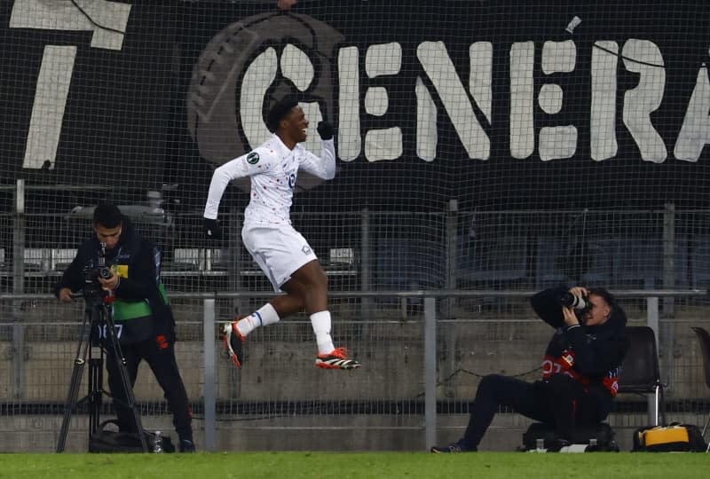Lille's Jonathan David celebrates scoring his side's second goal during the UEFA Europa Conference League soccer match between Sturm Graz and OSC Lille at the Merkur-Arena. Erwin Scheriau/APA/dpa