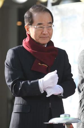 Lotte Group Vice Chairman Lee In-won attends an event in Seoul, South Korea, December 16, 2015. Kim Do-hoon/Yonhap via REUTERS