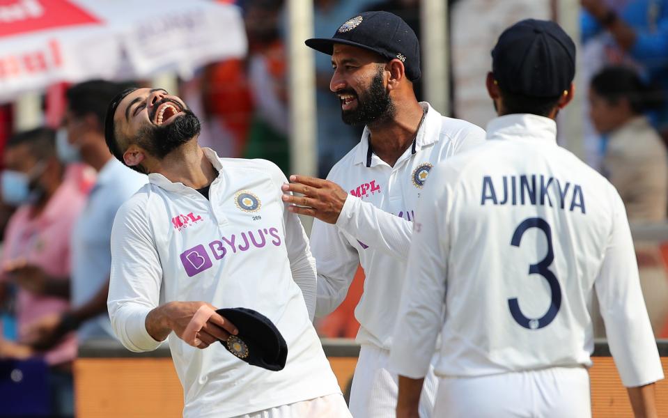 India celebrate after thrashing England - GETTY IMAGES