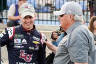 May 23, 2019; Concord, NC, USA; Monster Energy NASCAR Cup Series driver William Byron (24) celebrates with team owner Rick Hendrick for winning the pole during qualifying for the Coca-Cola 600 at Charlotte Motor Speedway. Mandatory Credit: Jim Dedmon-USA TODAY Sports
