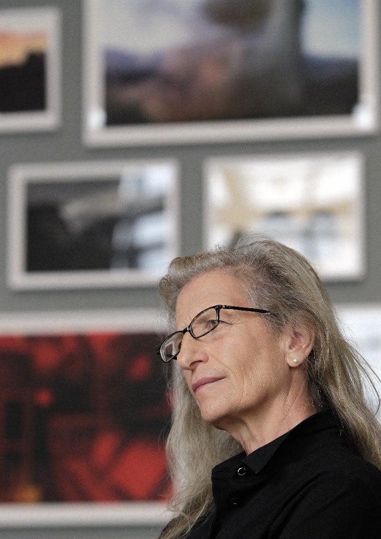 Annie Leibovitz answers questions during an interview before the opening of her exhibition at the Wexner Center for the Arts Friday, Sept. 21, 2012, in Columbus, Ohio. Leibovitz's exhibition features work from her “Master Set,” an authoritative edition of 156 images. (AP Photo/Jay LaPrete)