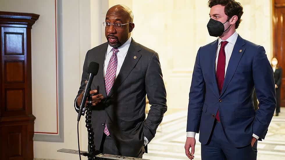 Sen. Raphael Warnock (D-Ga.) speaks to reporters after hearing from President Biden at a Democratic caucus luncheon at the Senate Russell Office building to discuss voting rights and filibuster reform on Thursday, January 13, 2022.