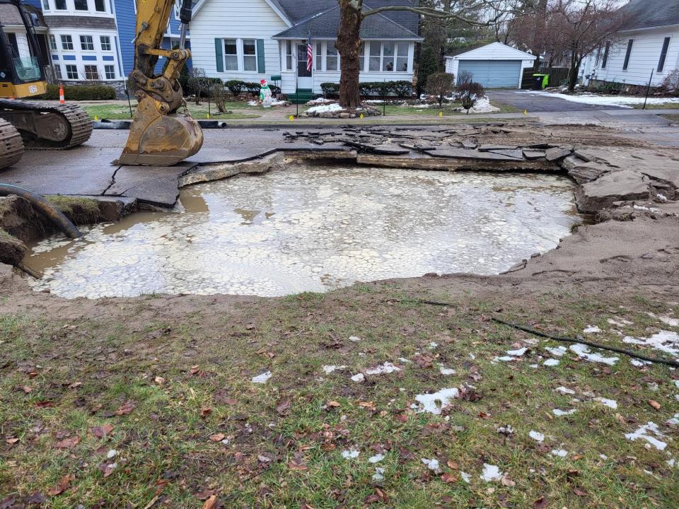 The damage from a break in a 30-inch water transmission main on Baseline Road in Northville before water was removed from the break site.