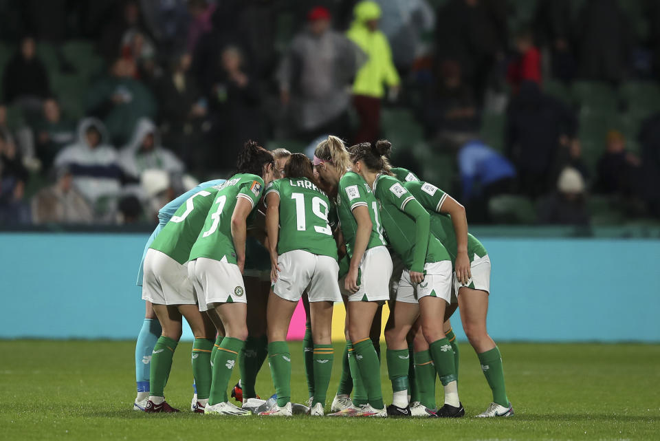 The Irish team form a huddle before starting the second half during the Women's World Cup Group B soccer match between Canada and Ireland in Perth, Australia, Wednesday, July 26, 2023. (AP Photo/Gary Day)