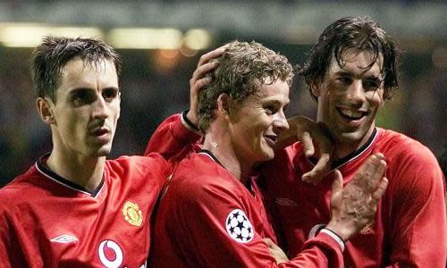 Ole Gunnar Solskjær celebrates with Gary Neville and Ruud van Nistelrooy after a 3-0 win against Olympiakos in 2001