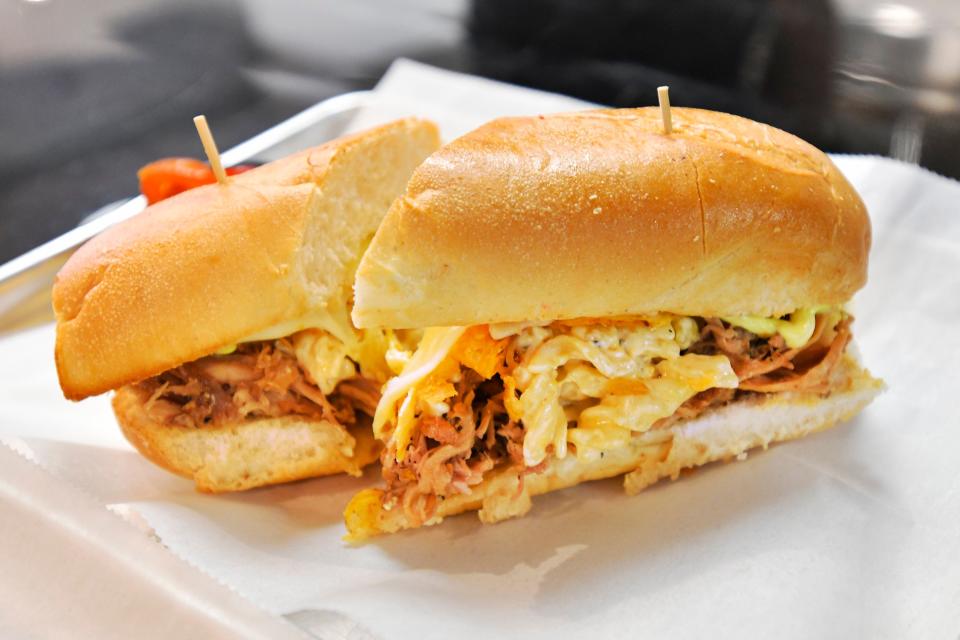 Named for a Talking Heads song, Lone Wolf Co.'s "Psycho Killer" features Cheerwine Pork, Mac-N-Cheese, hot peppers, crushed up Voodoo Chips, Provolone cheese and curry mayo.