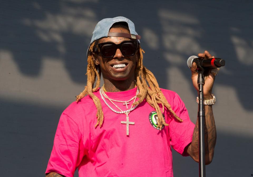 In this June 16, 2018 photo, Lil Wayne performs on Day 3 of the 2018 Firefly Music Festival at The Woodlands in Dover, Del.  (Photo by Owen Sweeney/Invision/AP, File)