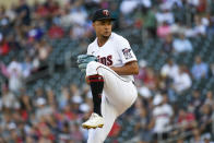 Minnesota Twins pitcher Chris Archer winds up to throw against the Colorado Rockies during the first inning of a baseball game, Saturday, June 25, 2022, in Minneapolis. (AP Photo/Craig Lassig)