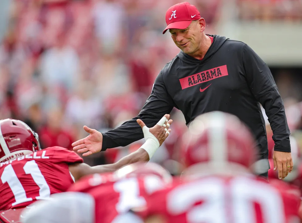  Head coach Kalen DeBoer of the Alabama Crimson Tide encourages his  prior to kickoff against the Western Kentucky Hilltoppers at Bryant-Denny Stadium on August 31, 2024 in Tuscaloosa, Alabama. (Photo by Brandon Sumrall/Getty Images)