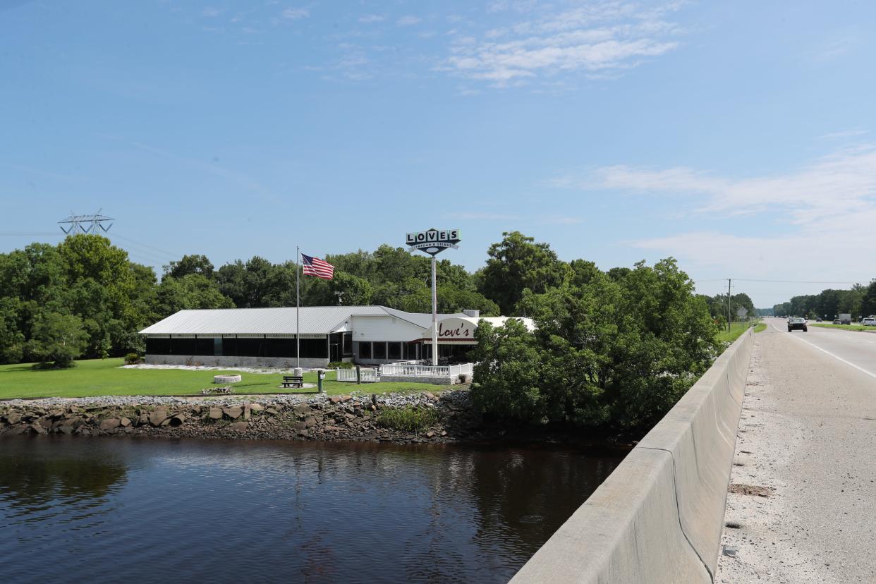 The bridge over the Ogeechee River on US 17 and Loves Seafood made an appearance in the movie "Forest Game", which was filmed in the Savannah area in 1993. Loves Seafood was transformed into a venue where Jenny performs.