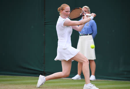 Tennis - Wimbledon - All England Lawn Tennis and Croquet Club, London, Britain - July 5, 2018. Belgium's Alison Van Uytvanck plays a shot during her second round match against Spain's Garbine Muguruza. REUTERS/Toby Melville