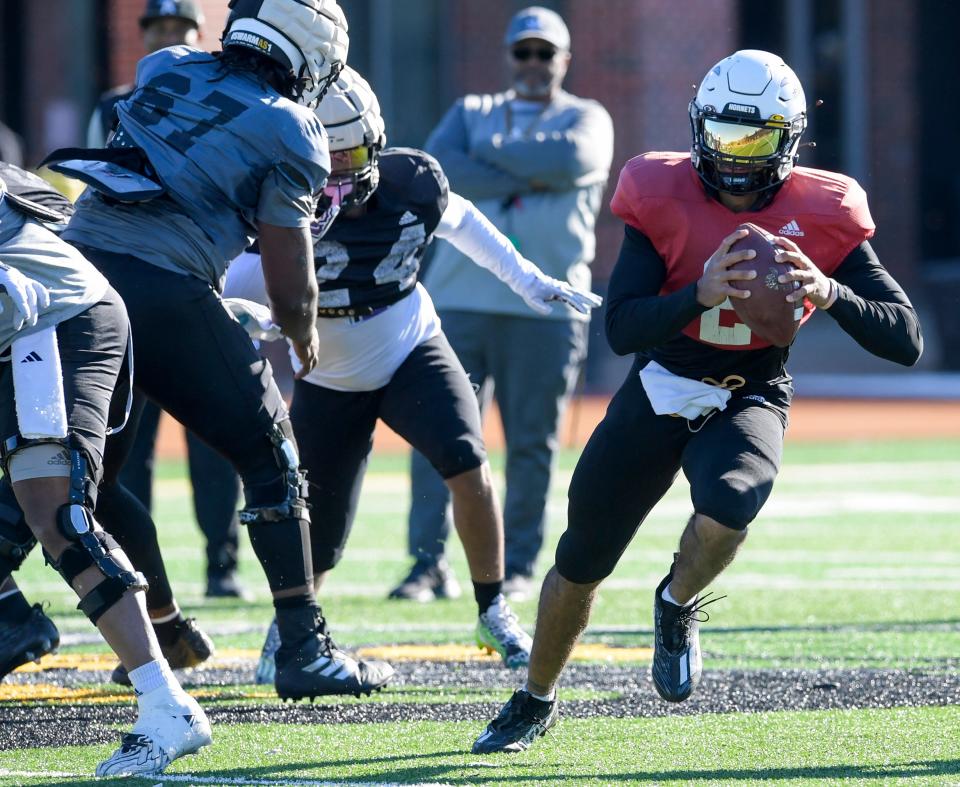 Quarterback Andrew Body rolls out during an Alabama State University football practice / scrimmage on the ASU campus in Montgomery, Ala., on Thursday March 28, 2024.