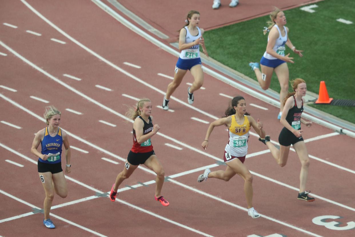 Runners in the Class AA girls 200-meter dash preliminaries Friday at the 2022 South Dakota high school state track meet Friday at Howard Wood Field in Sioux Falls.