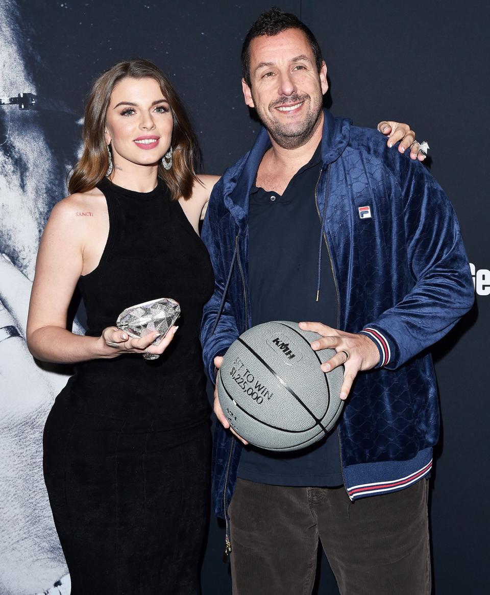 <i>Uncut Gems</i> costars Julia Fox and Adam Sandler hit the red carpet together at the premiere of their A24 film at The Dome at ArcLight Hollywood on Wednesday. 