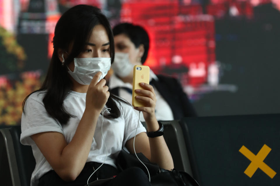 MOSCOW, RUSSIA - JUNE 10, 2020: A woman in a face mask in the departure area at Vnukovo International Airport, its management set to gradually ease public health safety measures imposed at the onset of the COVID-19 pandemic in Russia. Sergei Karpukhin/TASS (Photo by Sergei Karpukhin\TASS via Getty Images)