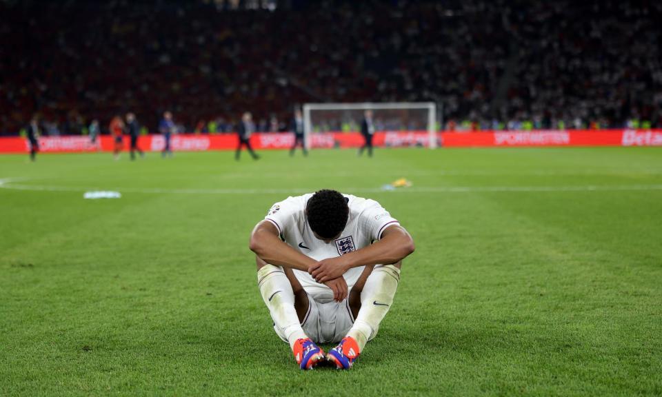 <span>England’s Jude Bellingham slumps in dejection after the defeat.</span><span>Photograph: Alex Pantling/Uefa/Getty Images</span>