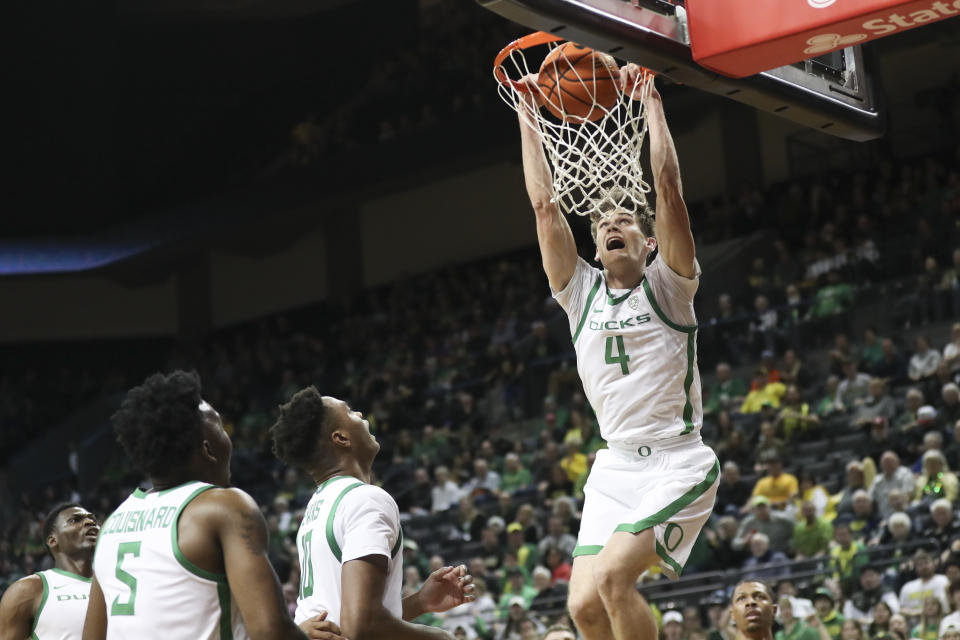 Oregon guard Brennan Rigsby (4) dunks against Oregon State during the first half of an NCAA college basketball game Wednesday, Feb. 28, 2024, in Eugene, Ore. (AP Photo/Amanda Loman)
