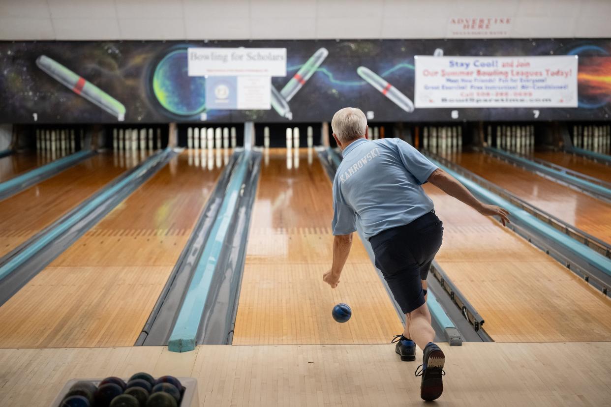 Rick Kamrowski warms up before competing in "Bowling for Scholars" a TV program that raises money for college students hosted at Sparetime Recreation in Whitinsville on Thursday.