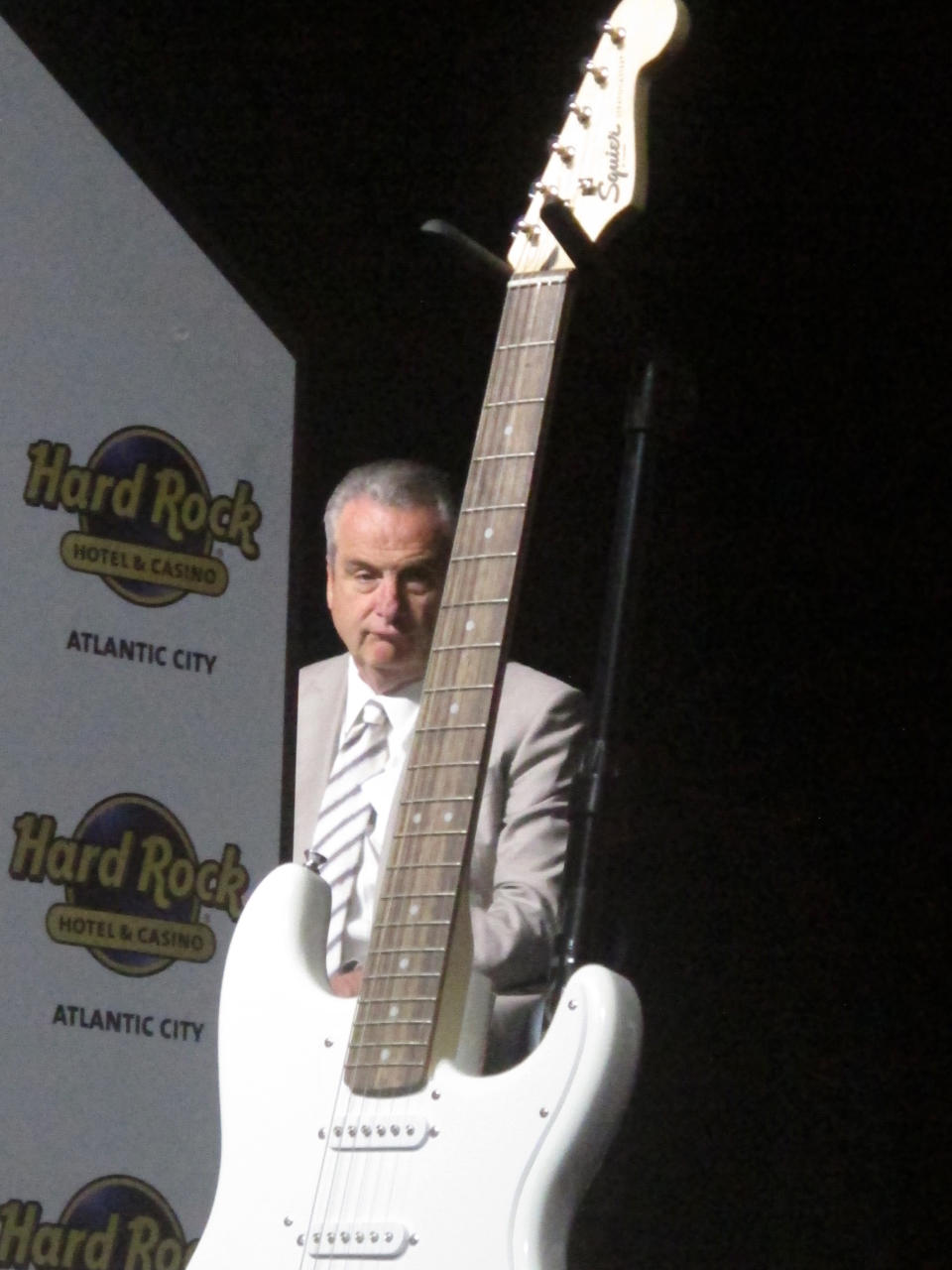 Jim Allen, CEO of Hard Rock International, waits to speak during an employee meeting at the Hard Rock casino in Atlantic City, N.J. on Jan. 16, 2020. On Sept. 12, 2022, Hard Rock announced it is spending over $100 million to give significant raises to 10,000 non-tipped workers, most of them in the U.S. (AP Photo/Wayne Parry)