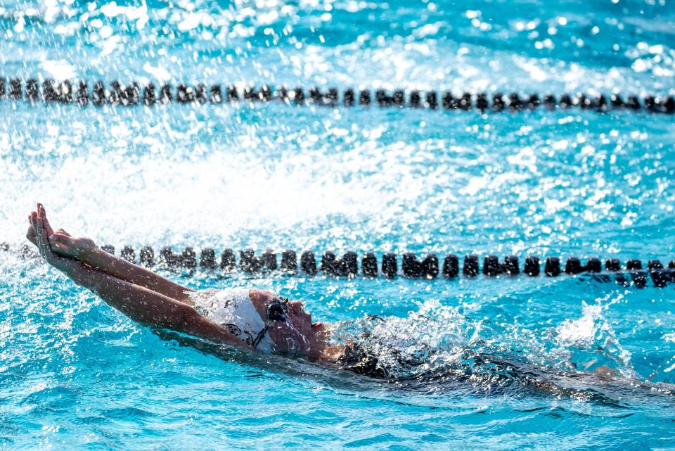 Ashlyn Tierney, 14, a freshman student athlete on Arizona College Prep’s swim team, swims during a practice at Chandler High School’s Kerry Croswhite Aquatic Center in Chandler on September 20, 2022.