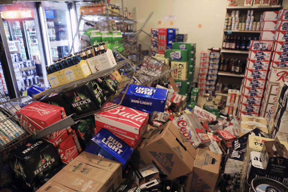 Cases of beer lie jumbled in a walk-in cooler at Value Liquor after an earthquake on Friday, Nov. 30, 2018, in Anchorage, Alaska. Owner Mary Funner says beer, wine and other bottled alcohol was strewn throughout store aisles after the quake. (Photo: Dan Joling/AP)