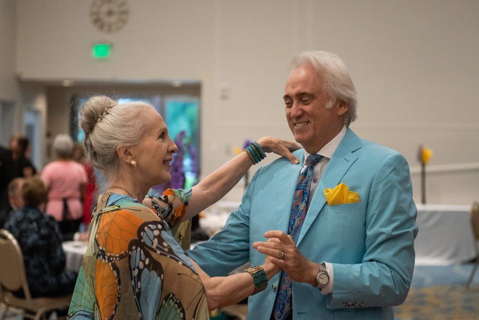 Sandra and David Samore of Wellington dance together during a 'Young At Heart' prom for seniors held at the the Royal Palm Beach Cultural Center on Friday, May 26, 2023, in Royal Palm Beach, Fla.