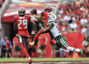 <p>Tampa Bay Buccaneers cornerback Brent Grimes (24) intercepts a pass during the first half of an NFL game between the New York Jets and the Tampa Bay Buccaneers on November 12, 2017, at Raymond James Stadium in Tampa, FL. (Photo by Roy K. Miller/Icon Sportswire) </p>