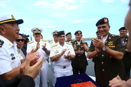 Venezuela's Defense Minister Vladimir Padrino Lopez (R) attends the arrival ceremony of the China's People's Liberation Army (PLA) Navy hospital ship Peace Ark at the port in La Guaira, Venezuela September 22, 2018. REUTERS/Manaure Quintero