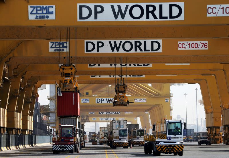 FILE PHOTO: Terminal tractors line up to load containers at DP World's Terminal 2 at Jebel Ali Port in Dubai