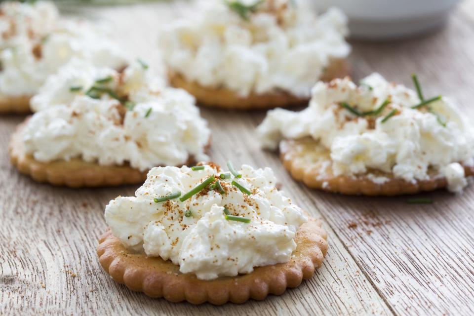 salticrax, south african cracker topped with cottage cheese with a sprinkling of cayenne pepper