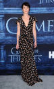 <p>Lena opted for a rather low-key look in a printed Carolina Herrera frock. <i>[Photo: Rex]<br></i></p>