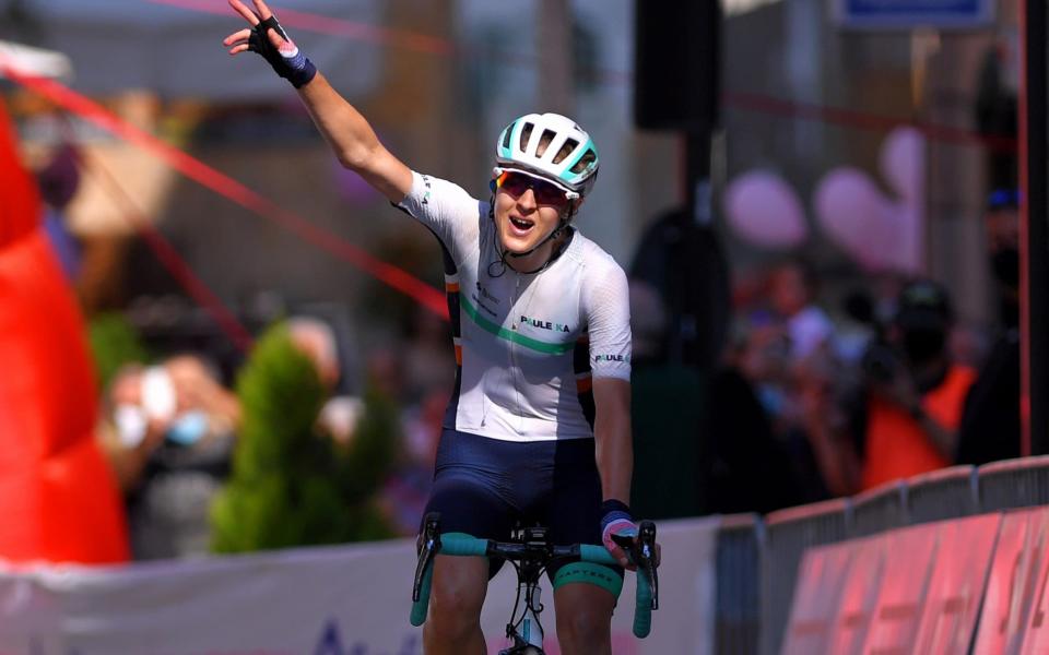 Lizzy Banks celebrates her victory at the Giro Roso while riding for Equipe Paule Ka  - GETTY IMAGES