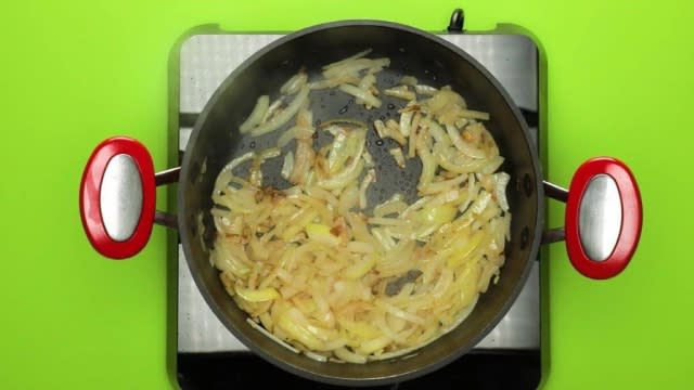 Browned onions in a pot