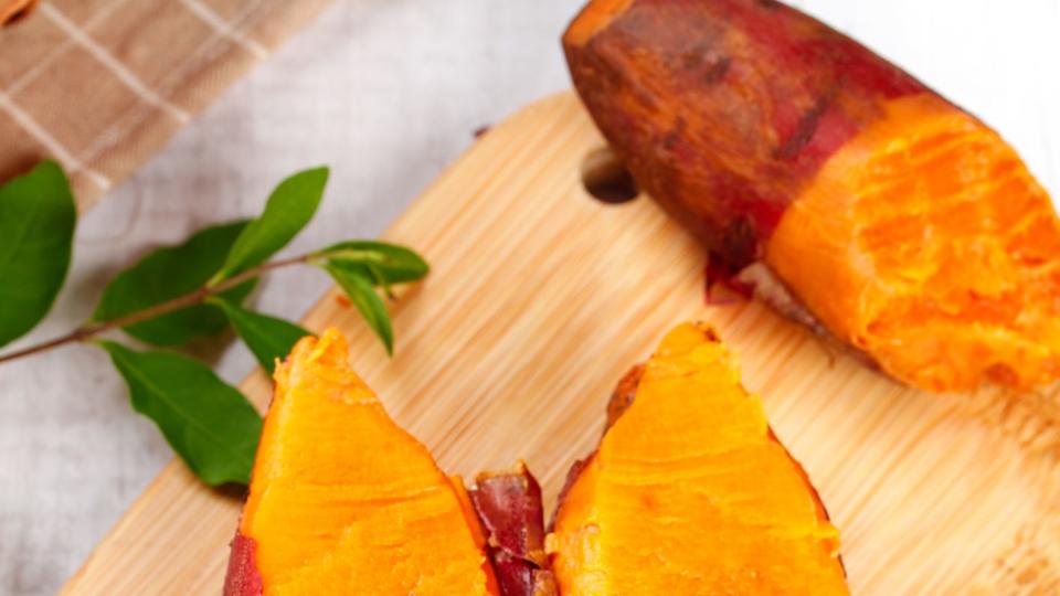 sandy sweet potatoes are placed on the board