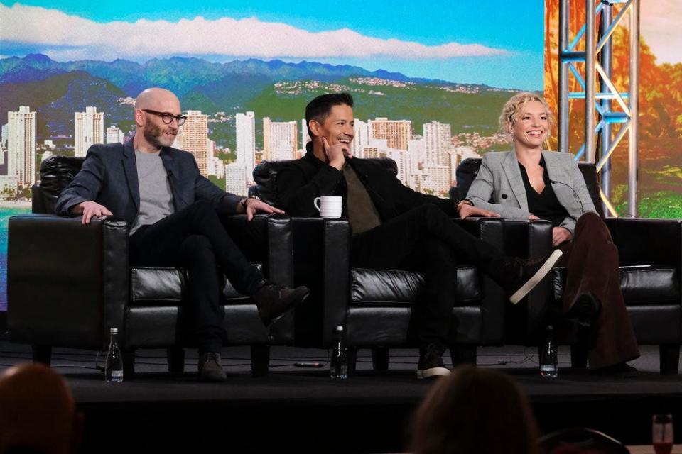 From left, "Magnum P.I." showrunner Eric Guggenheim, with stars Jay Hernandez and Perdita Weeks at a panel for the series on Jan. 15, 2023 in Pasadena, Calif